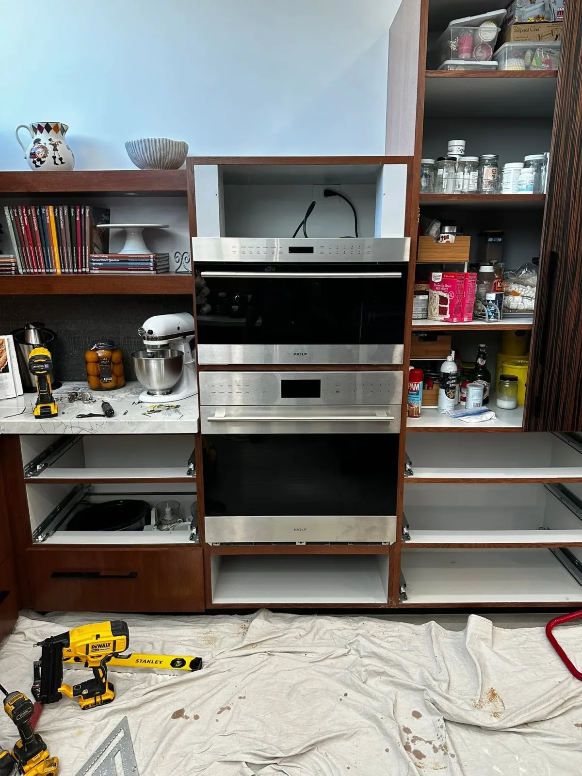 Built in appliance cabinetry and custom shelving by Ramos Cabinetry and Construction in Tempe, AZ