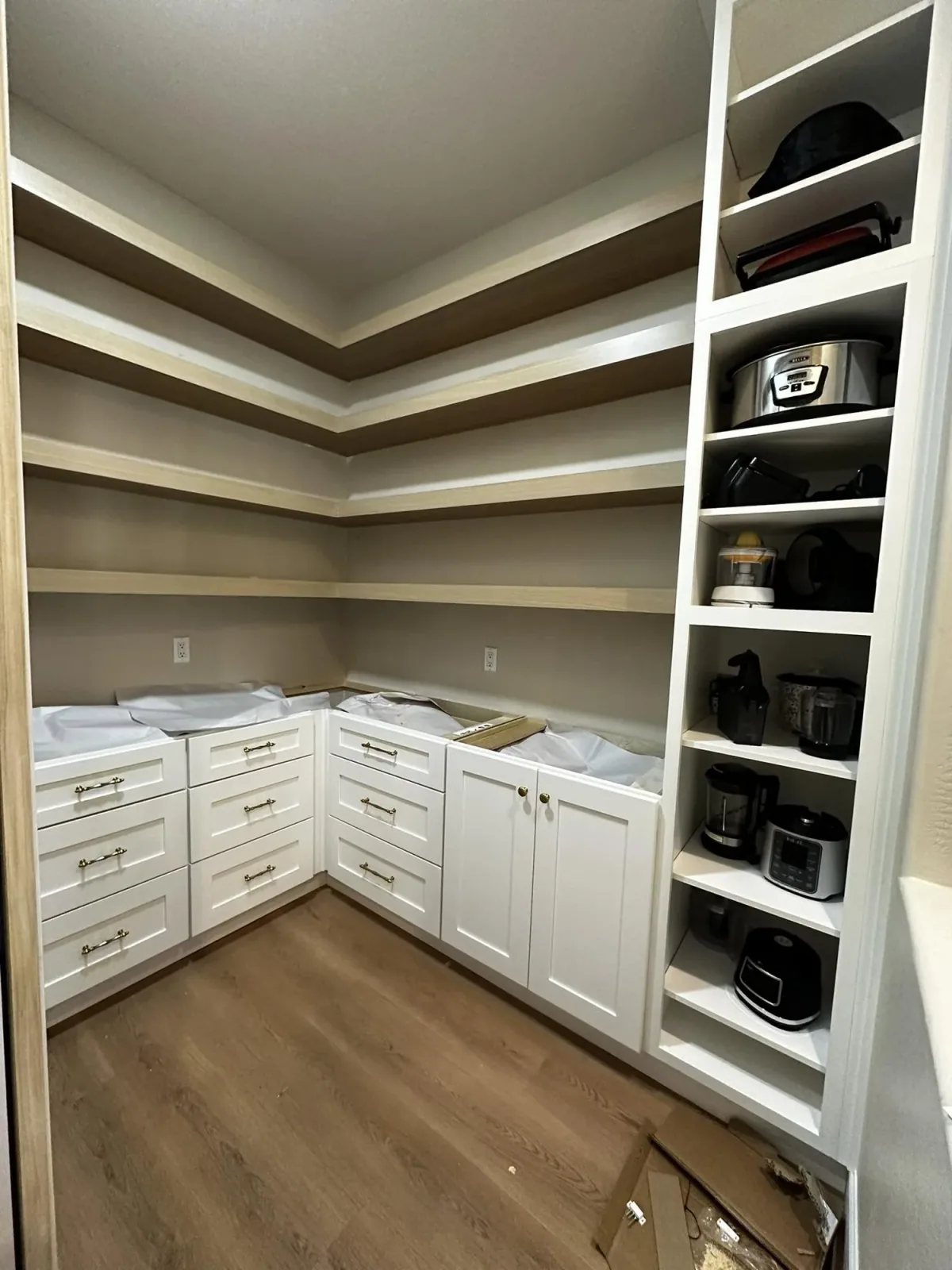 Cabinet installation progress for a remodeling project by Ramos Cabinetry and Construction in Chandler, AZ