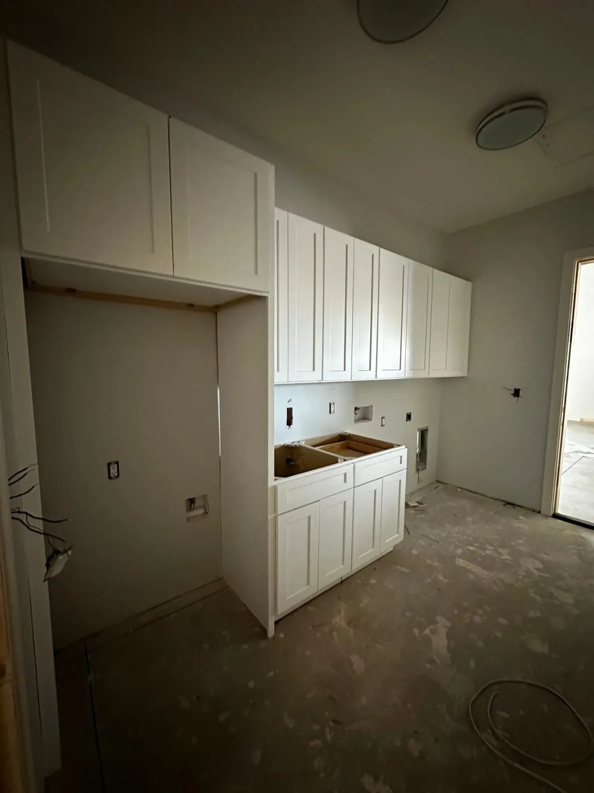 Kitchen cabinet installation in progress by Ramos Cabinetry and Construction in Phoenix, AZ