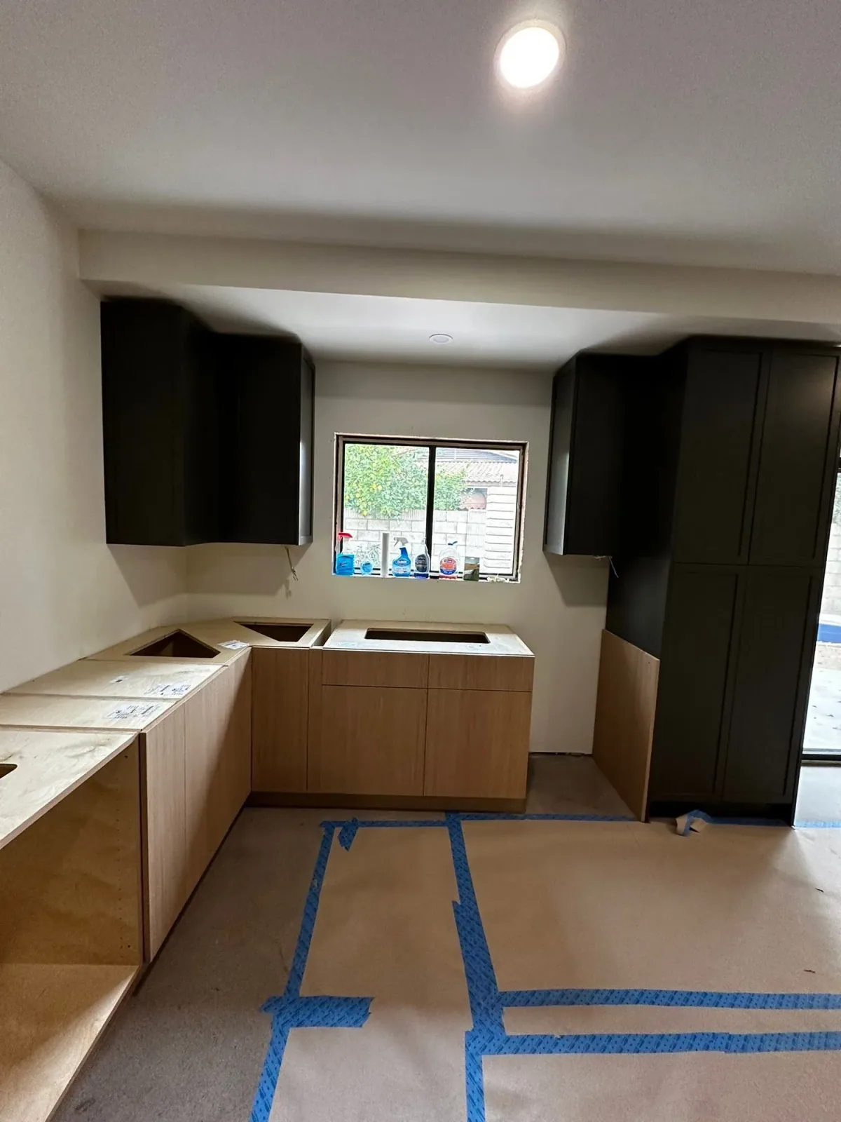 Cabinet installation progress for a remodeling project by Ramos Cabinetry and Construction in Tempe, AZ