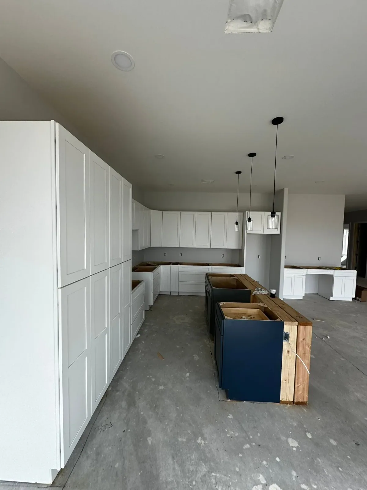 Kitchen cabinet installation in progress by Ramos Cabinetry and Construction in Tempe, AZ