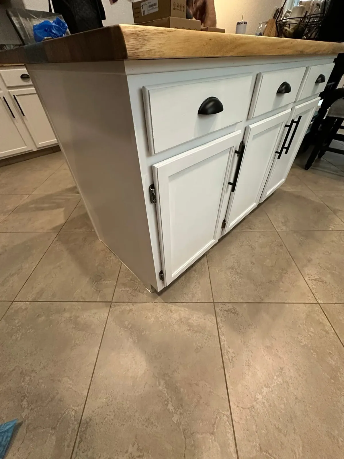 White custom cabinet storage wall by Ramos Cabinetry and Construction in Mesa, AZ