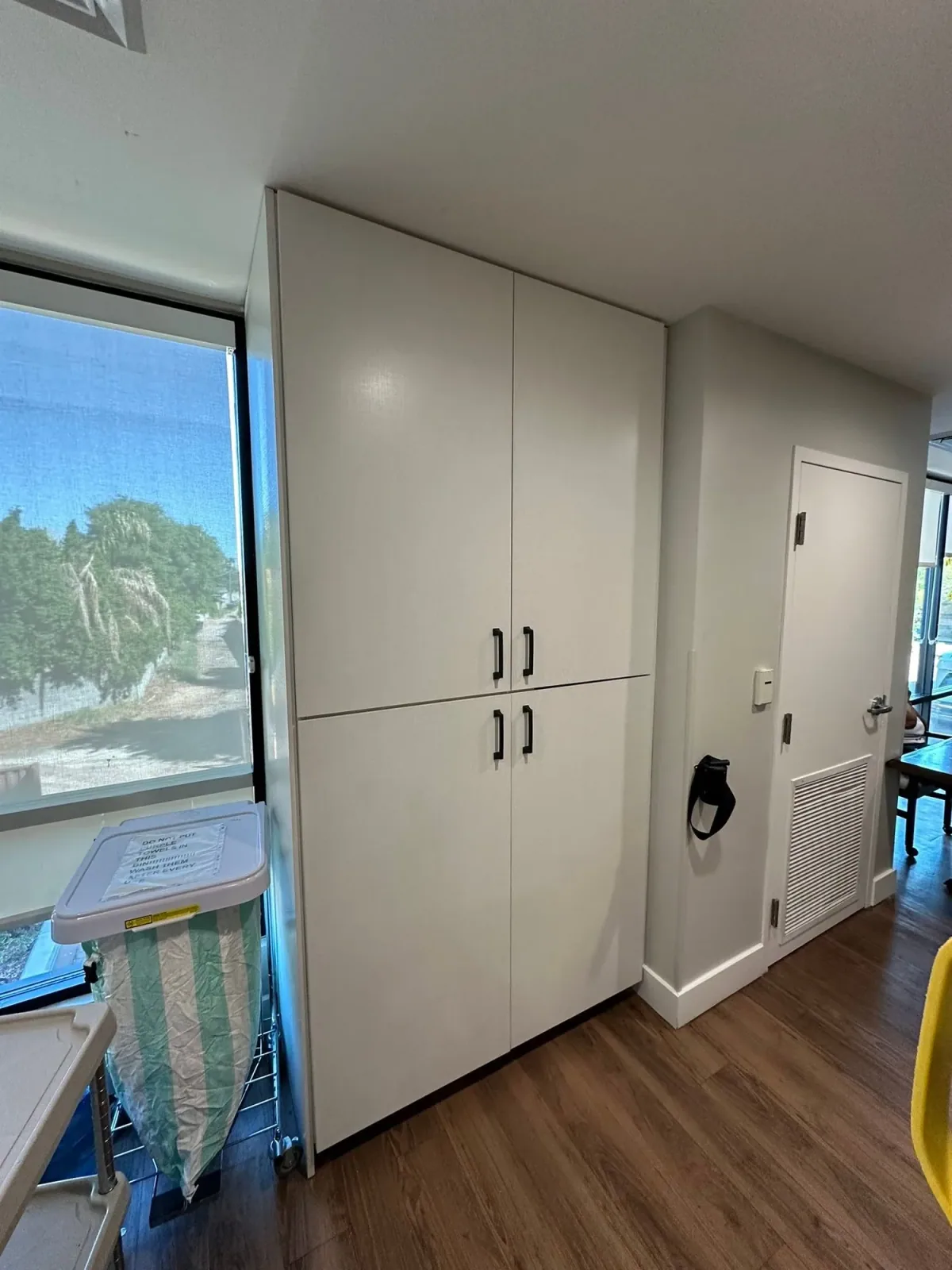 Tall storage cabinetry with custom cabinet doors by Ramos Cabinetry and Construction in Scottsdale, AZ